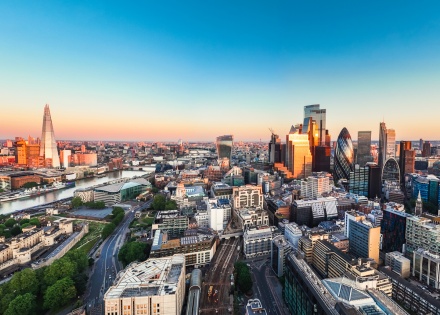 Aerial view of London England’s finance district at sunset