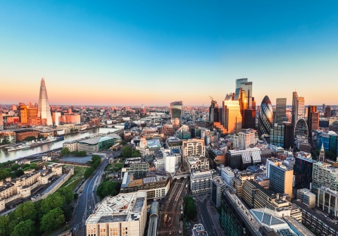 Aerial view of London England’s finance district at sunset