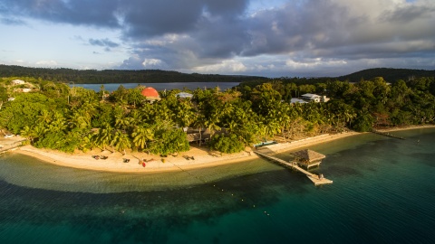 Aerial view of Tonga at sunset viewed from the ocean