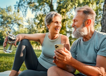 Smiling couple in a park enjoying Albania’s public holidays