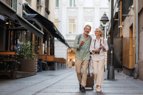 Couple enjoying a leisurely walk during an Italian public holiday