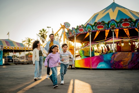 Family enjoying Taiwan's public holidays at an amusement park