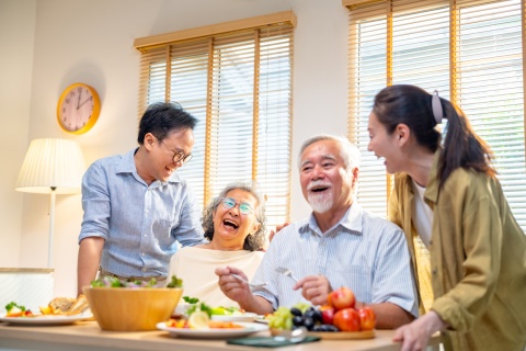 Family spending time together at home during a public holiday in Cambodia