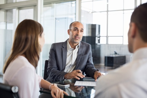 HR manager discussing HR and workplace investigations