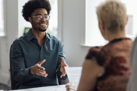 HR team members discussing how many interviews is too many