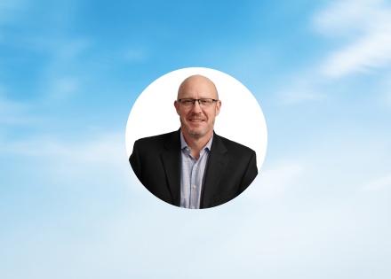Blue sky in background with photo of Jeff Wollard, Pebl's Chief Financial Officer