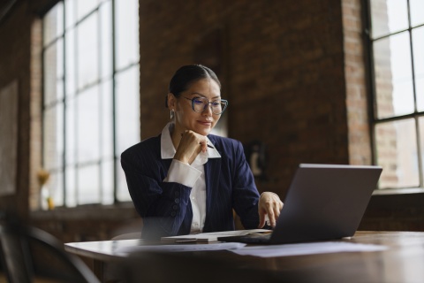 Global HR manager researching payroll tax in Laos