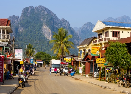 Street view of distant mountains in Vang Vieng Laos