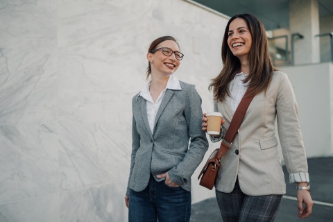 HR managers walking and talking about ITIN vs EIN