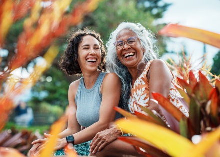 Two women spending time together outdoors, celebrating a public holiday in Fiji