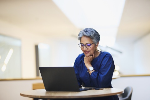 Global HR manager researching payroll tax in Switzerland