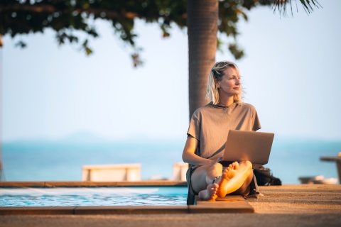 Businesswoman analyzing and fixing salary compression at a pool